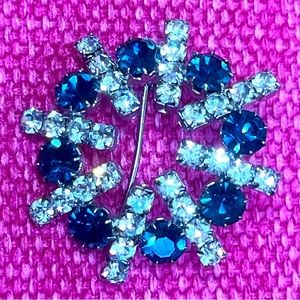 Vintage Rhinestone Snowflake Brooch. Blue and clear stones